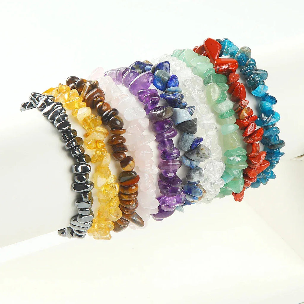 Set of colorful beaded bracelets on a white background