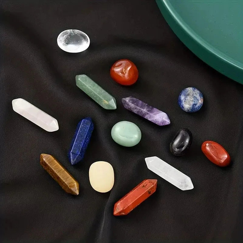 Collection of various crystals on a dark fabric background