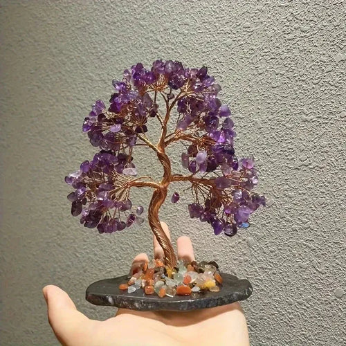 Amethyst crystal money tree feng shui decor purple gemstone tree held in hand view in light