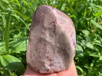 Pink druzy quartz geode crystal cluster back view showing natural stone base