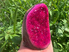 Pink druzy quartz geode crystal cluster front view with natural sparkling crystals